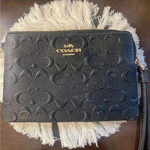 Black COACH corner zip wristlet
